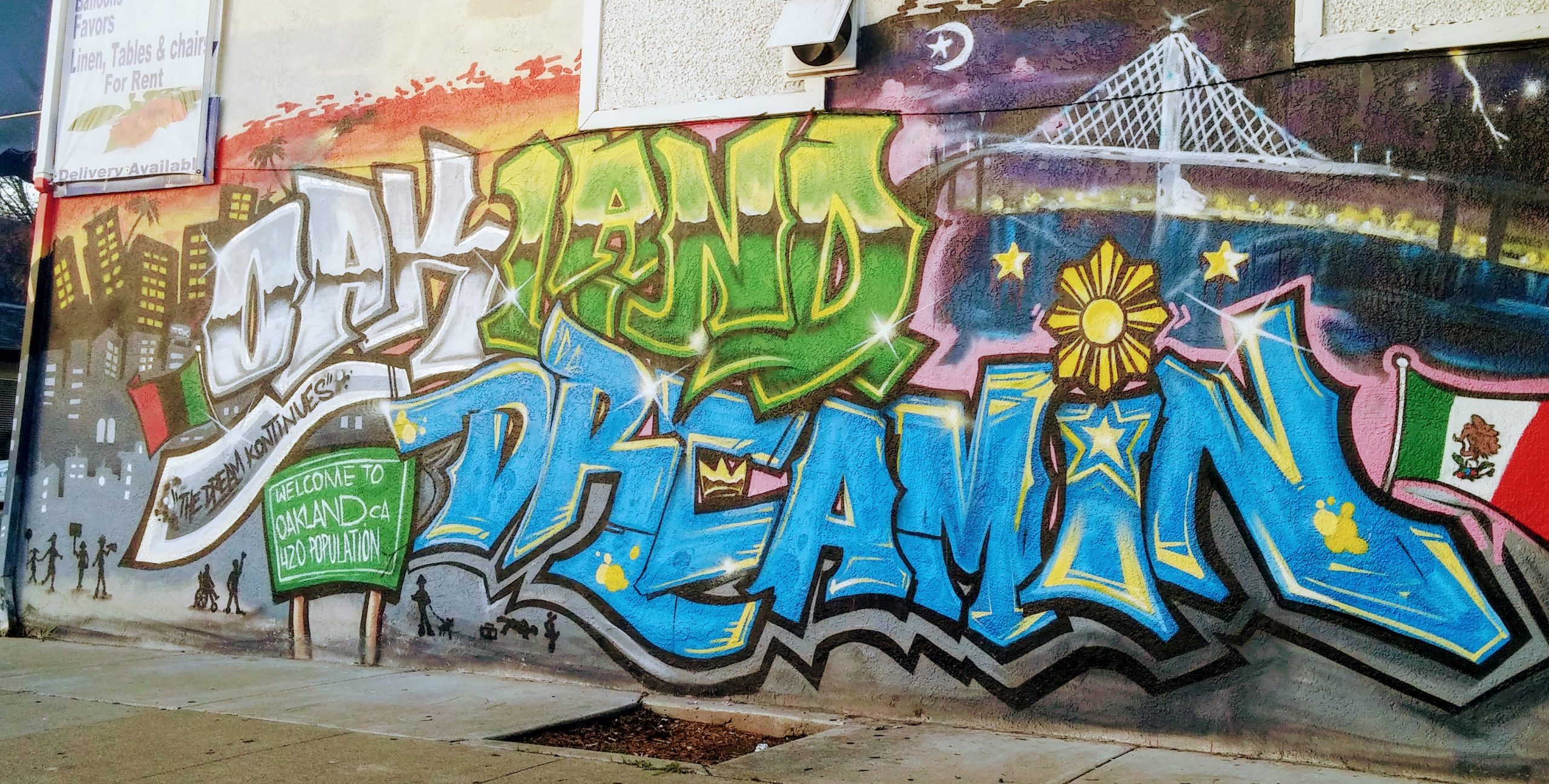 "Oakland Dreamin" mural by TDK with support from Lucky Three Seven. Photo Credit: Kat Ferreira