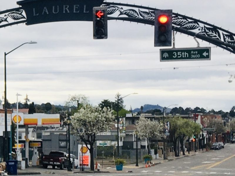 An arch over the street that says "Laurel."