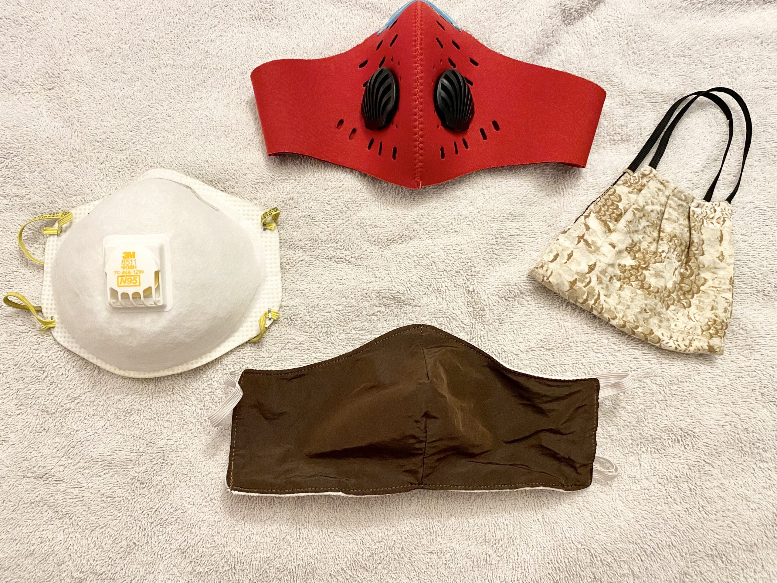 An image of several face masks laid out next to each other.