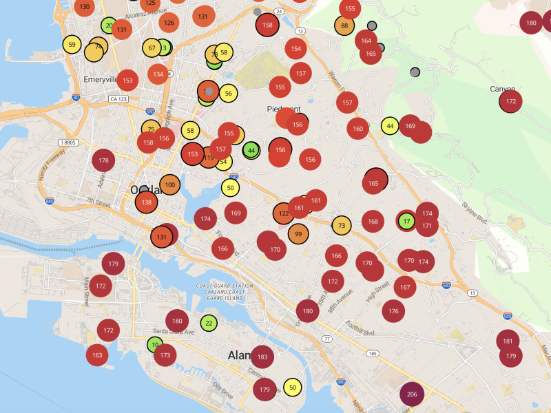 A Google map with various colored dots in Oakland showing the air quality is bad.