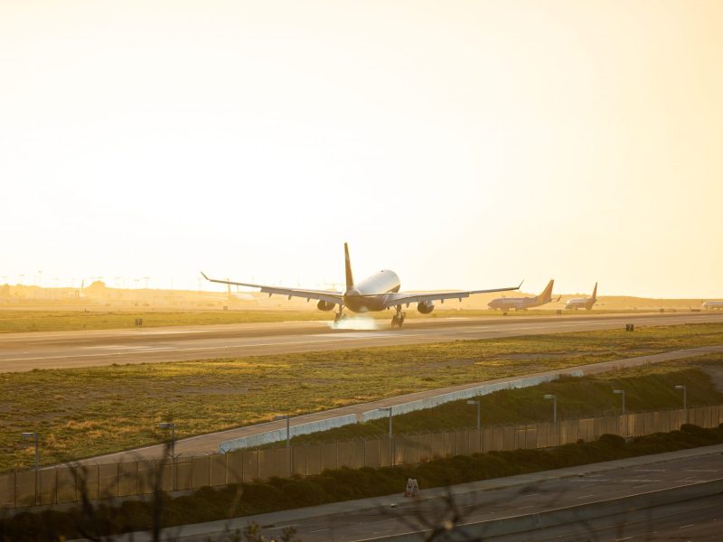 Photo of an airplane waiting to take off on the runway.