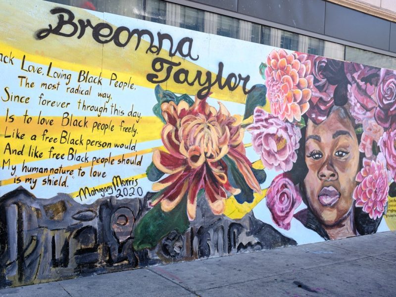 A colorful mural of Breonna Taylor.
