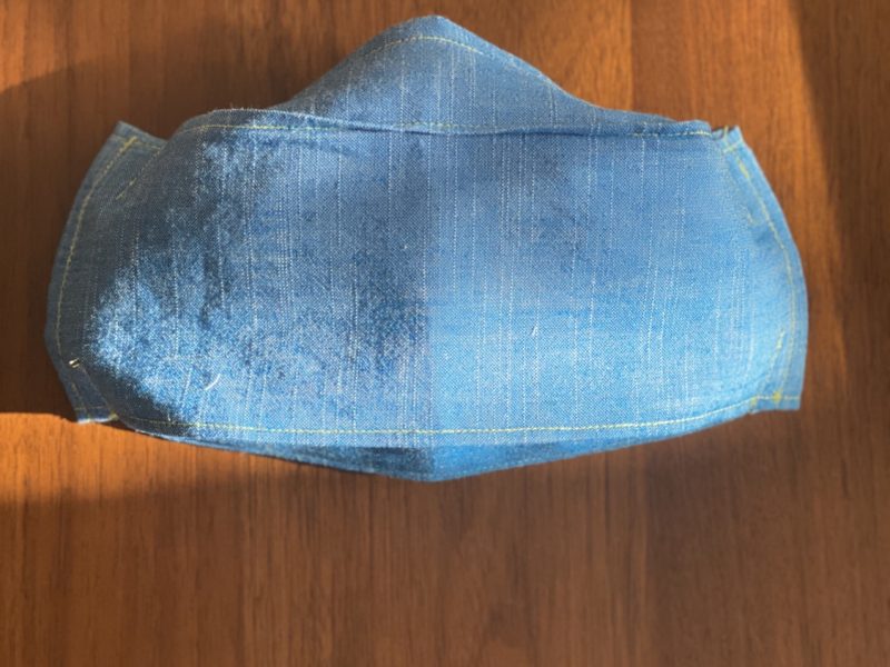 a light demin blue fabric mask