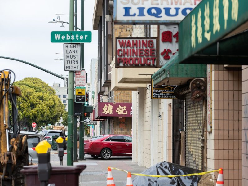 A Chinatown street corner that says "Webster"