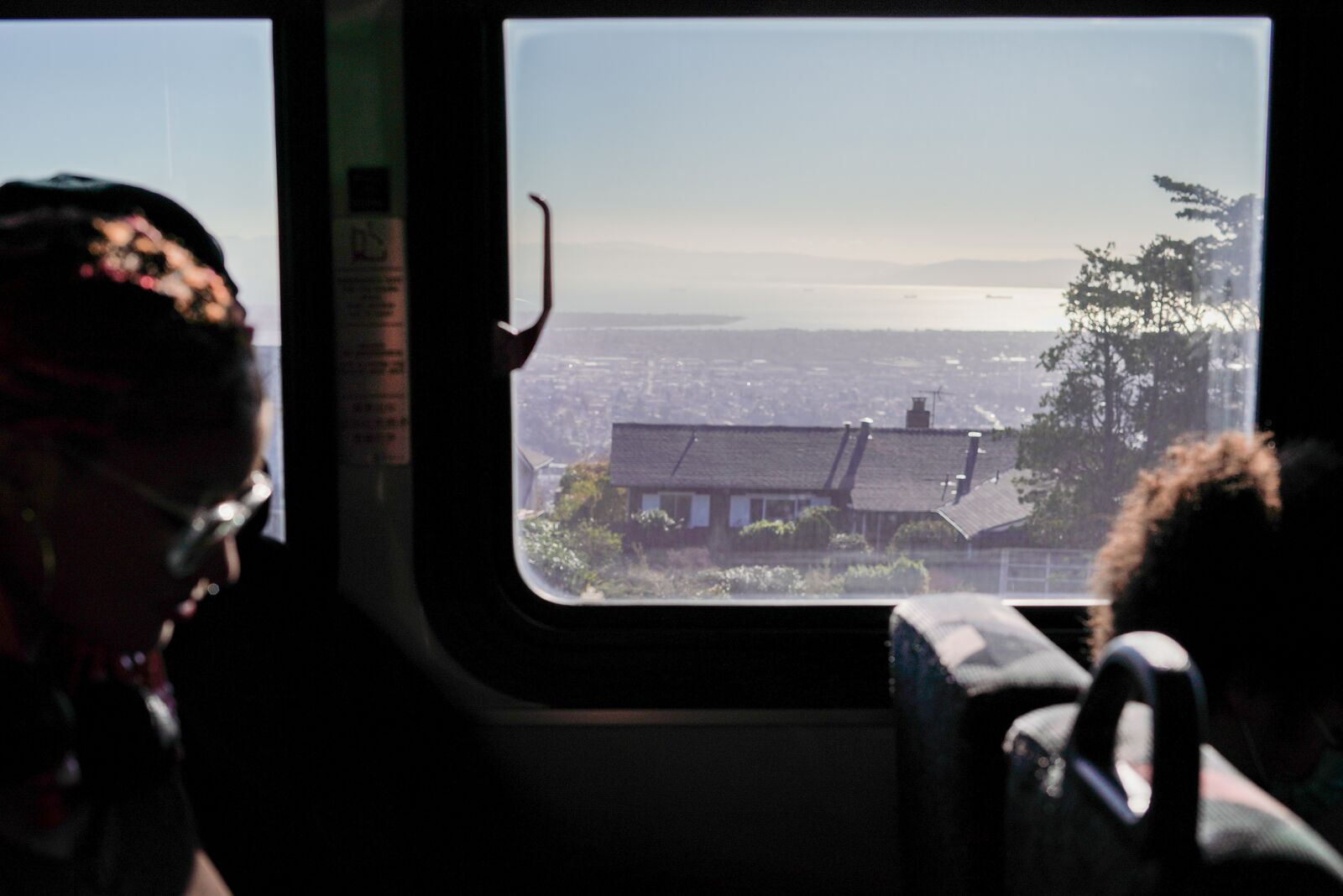 inside a bus, you can see the views of the bridge and bay area