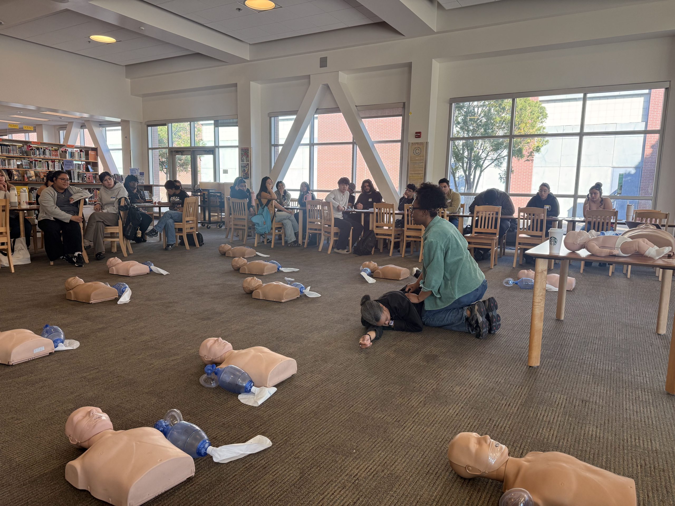 woman in middle of room surrounded by mannequins