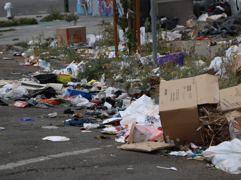 Trash piled on the street